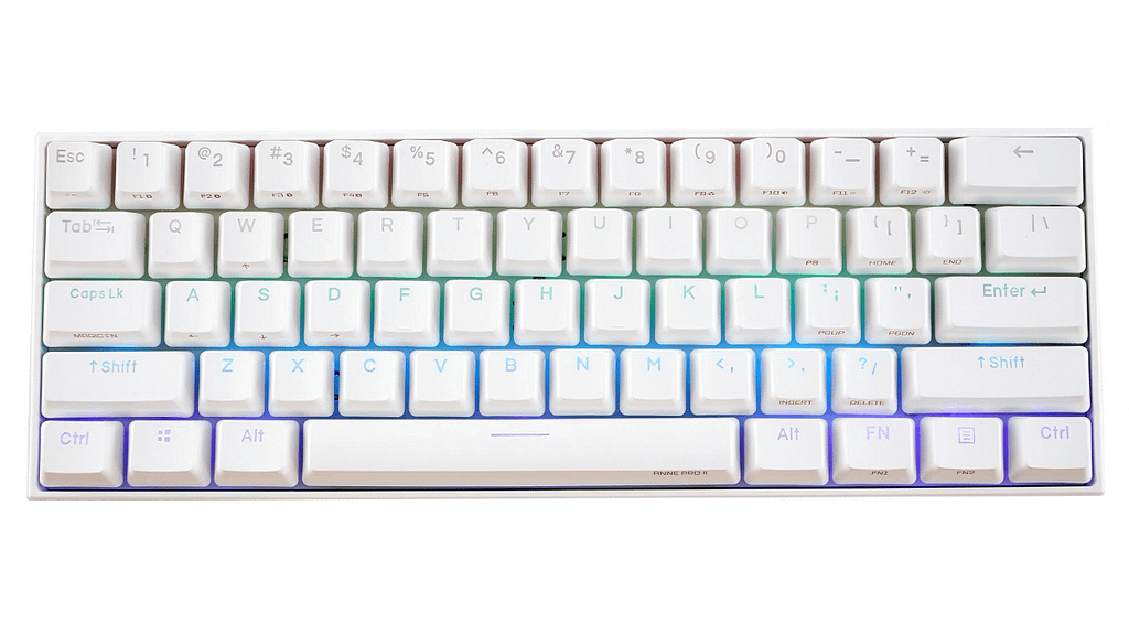 Top down view of a White Anne Pro 2, complimenting a minimalist home office setup