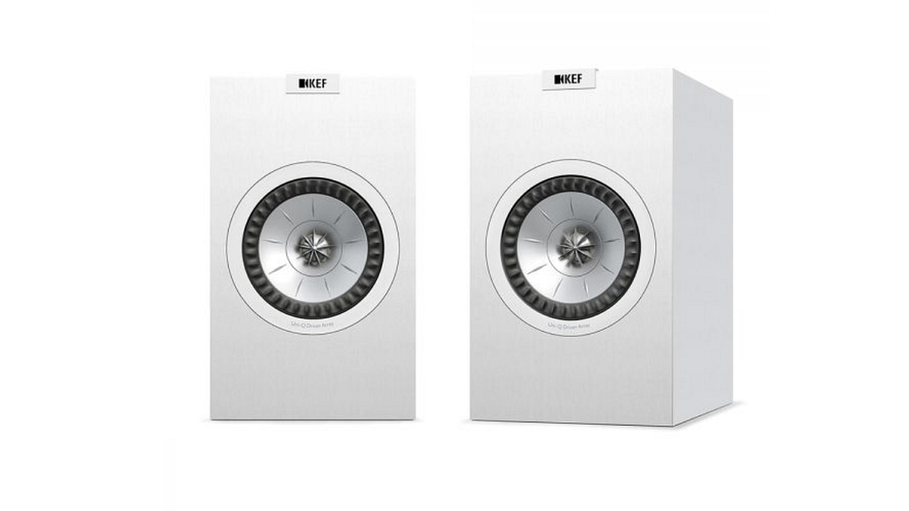 A pair of white Q150 KEF Bookshelf speakers against a plain background