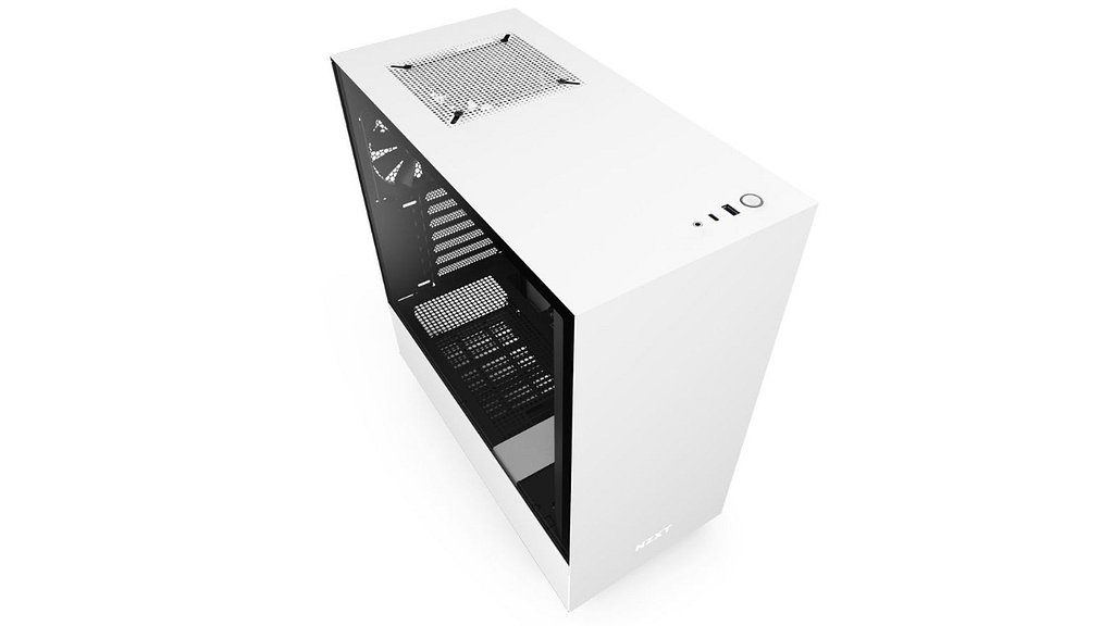 An angled photo of an empty white NZXT H510 mid-tower computer case with tempered glass side
