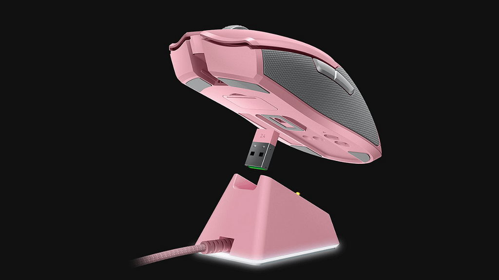 Exploded view of Quartz Viper Ultimate Mouse on top of charging dock with wireless adapter.