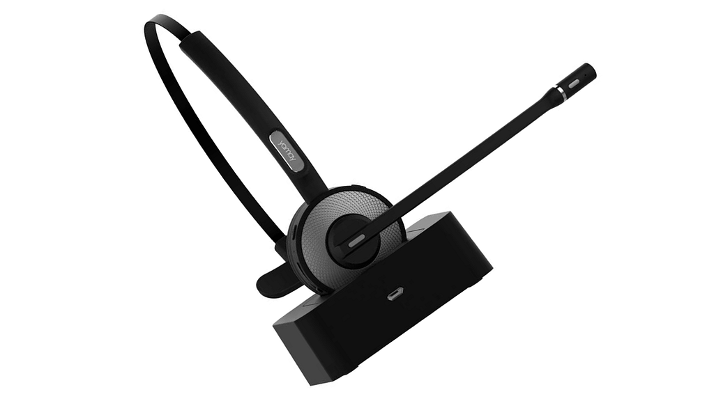 YAMAY Bluetooth headset M98 in chargin dock against a white background; our pick for the best office headset.