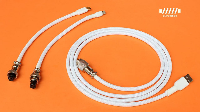 Detachable USB C Cables against orange desk