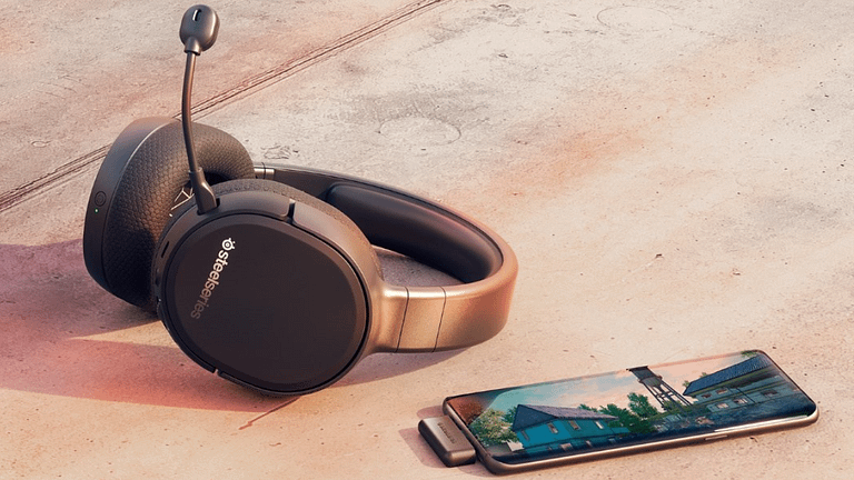 The best budget wireless gaming headset sitting against concrete with Fortnight in the foreground